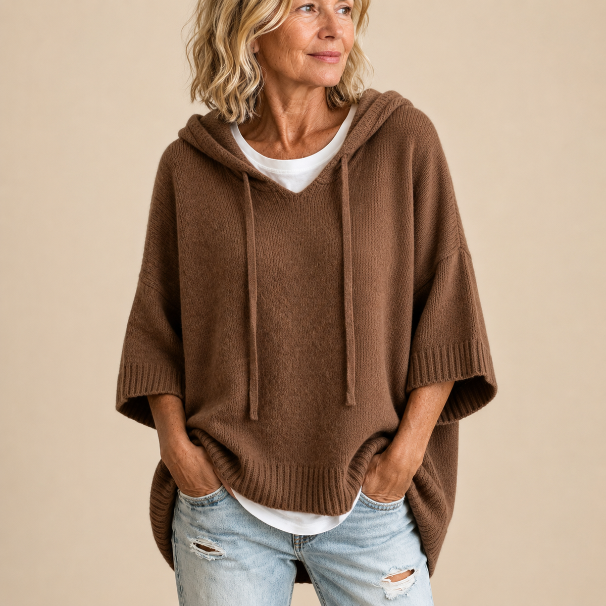 Vanmeeren™  | Gebreide poncho met capuchon en driekwartmouwen