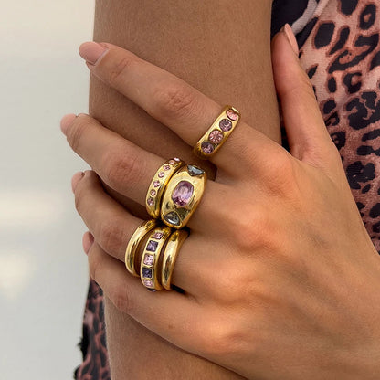 Vanmeeren™ | Set van 6 Goudkleurige Ringen met Paarse Zirkoon – Verstelbaar & Luxe Afwerking