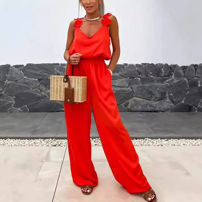 NOËLLE™ | Mouwloze jumpsuit met wijde pijpen