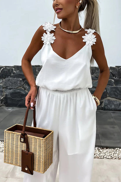 NOËLLE™ | Mouwloze jumpsuit met wijde pijpen