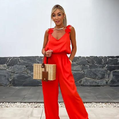 NOËLLE™ | Mouwloze jumpsuit met wijde pijpen
